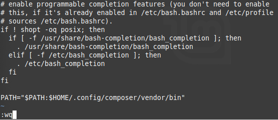 Terminal window at the end of .bashrc with the command `:wq` at the bottom