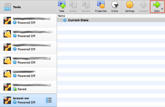 Oracle VM VirtualBox Manager with the 'laravel-vm' virtual machine and the 'Start' button highlighted