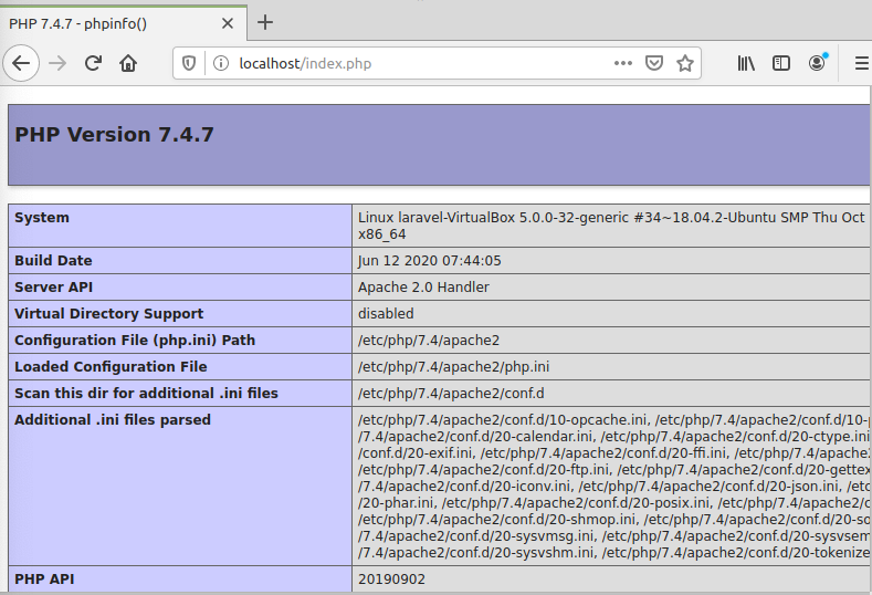 Firefox browser with the address 'localhost/index.php' displaying information about PHP